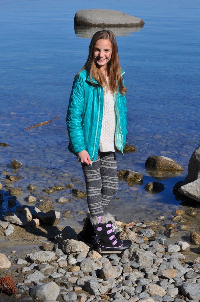 Hannah exploring the rocky coast.